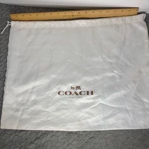 Coach white dust cover